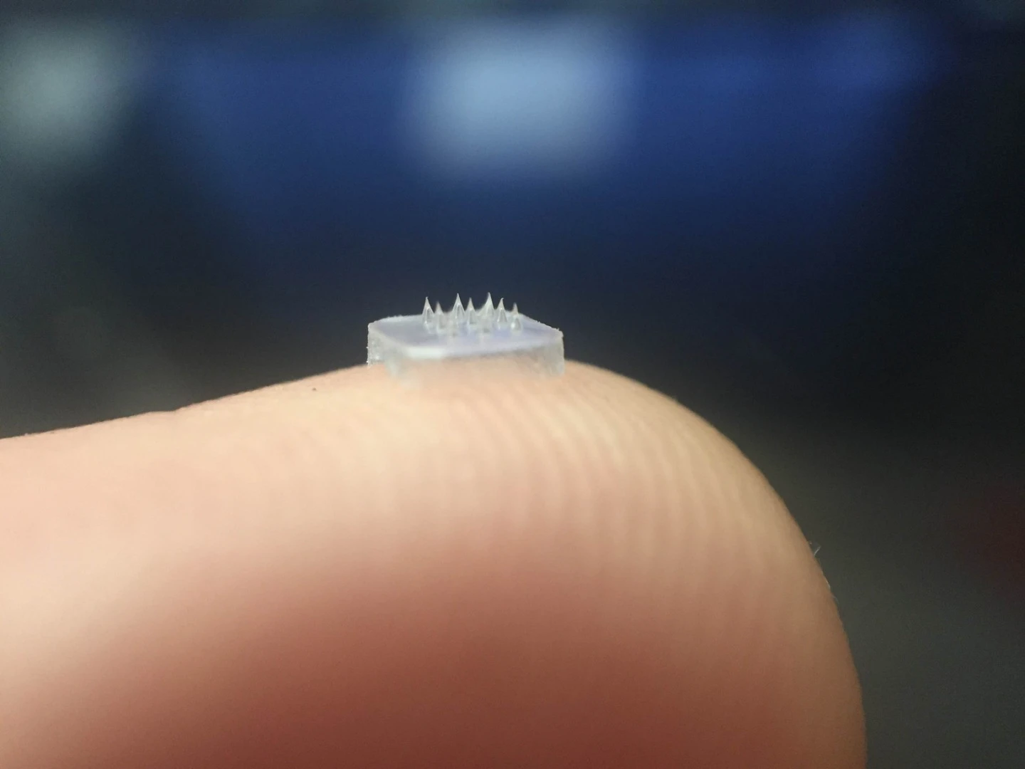 The eye patch measures 2 by 2 mm in its present form, and contains nine microneedles
