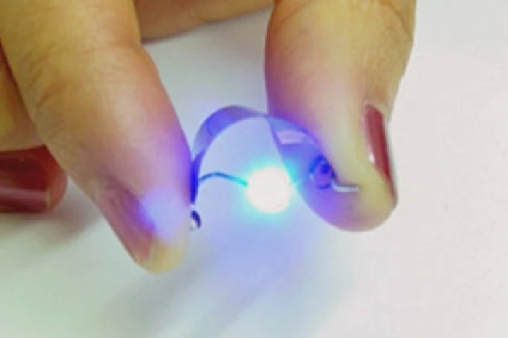 A NanoEnergy battery powering a blue LED