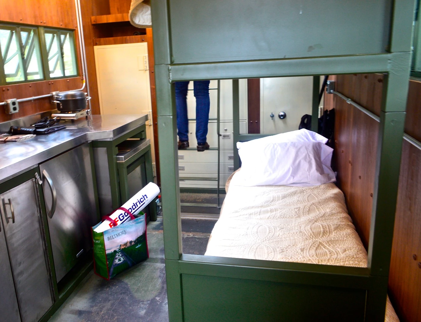 Bunk beds and metal surfaces give this expedition truck its utilitarian, military-fashioned look