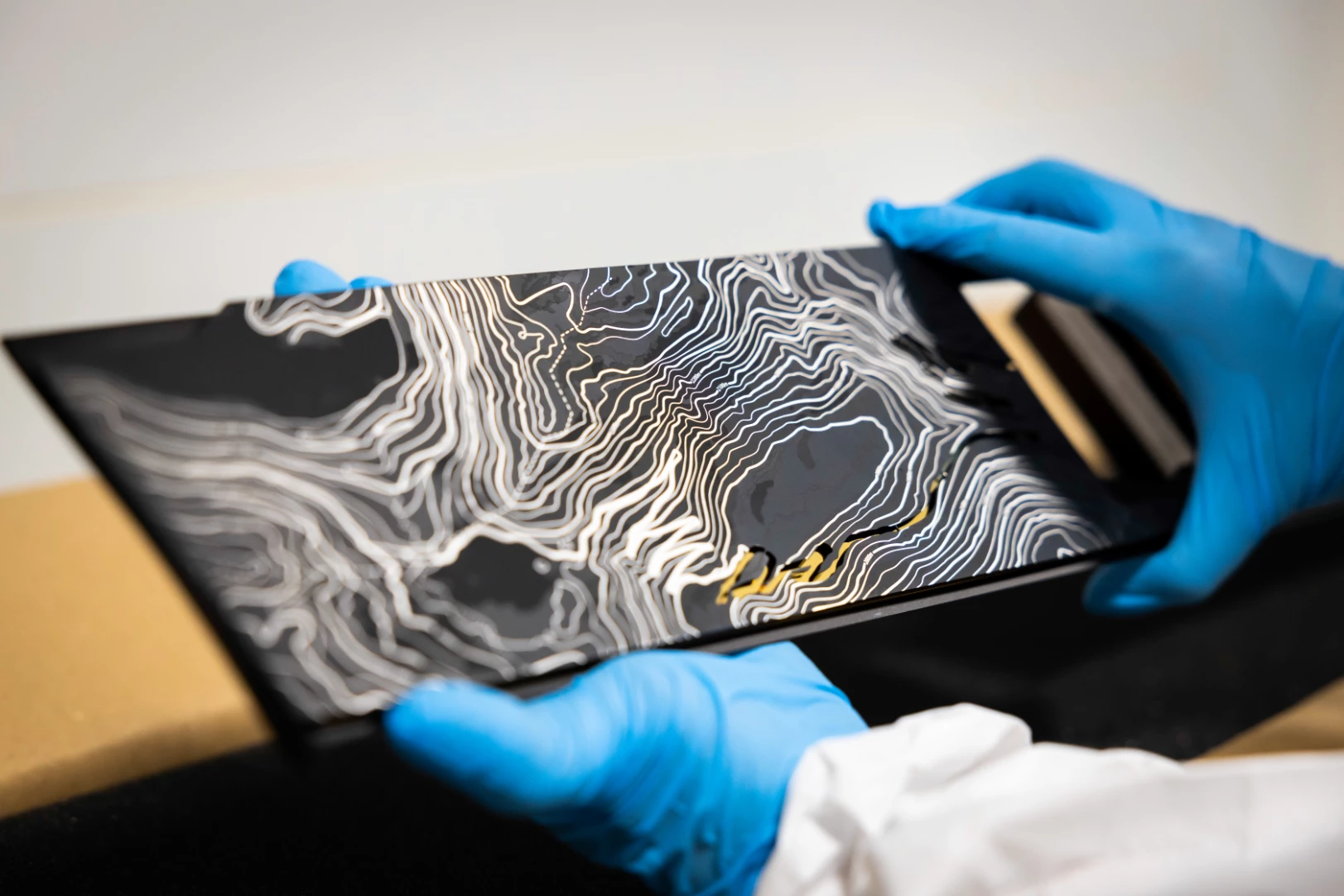 Fabricating the steel/gold fascia plate