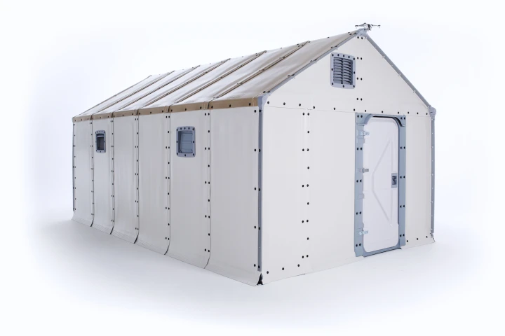 The Better Shelter includes windows, a locking door, and a solar panel on the roof