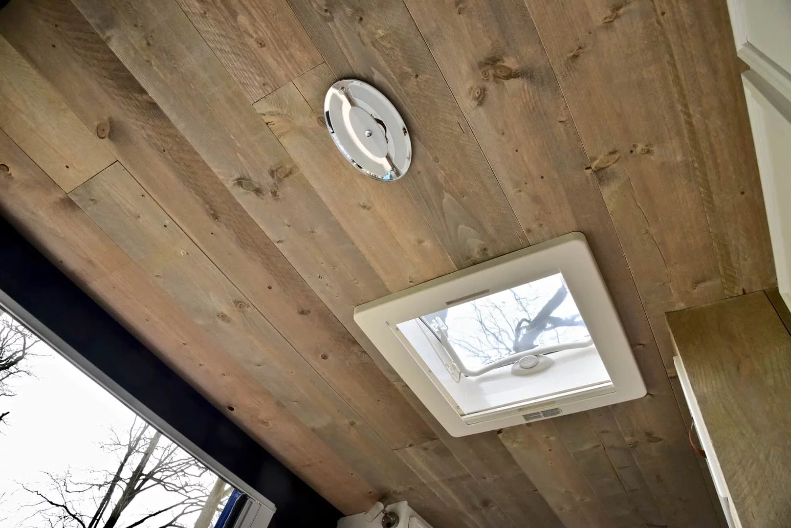 A look at the wood-lined ceiling and the skylight