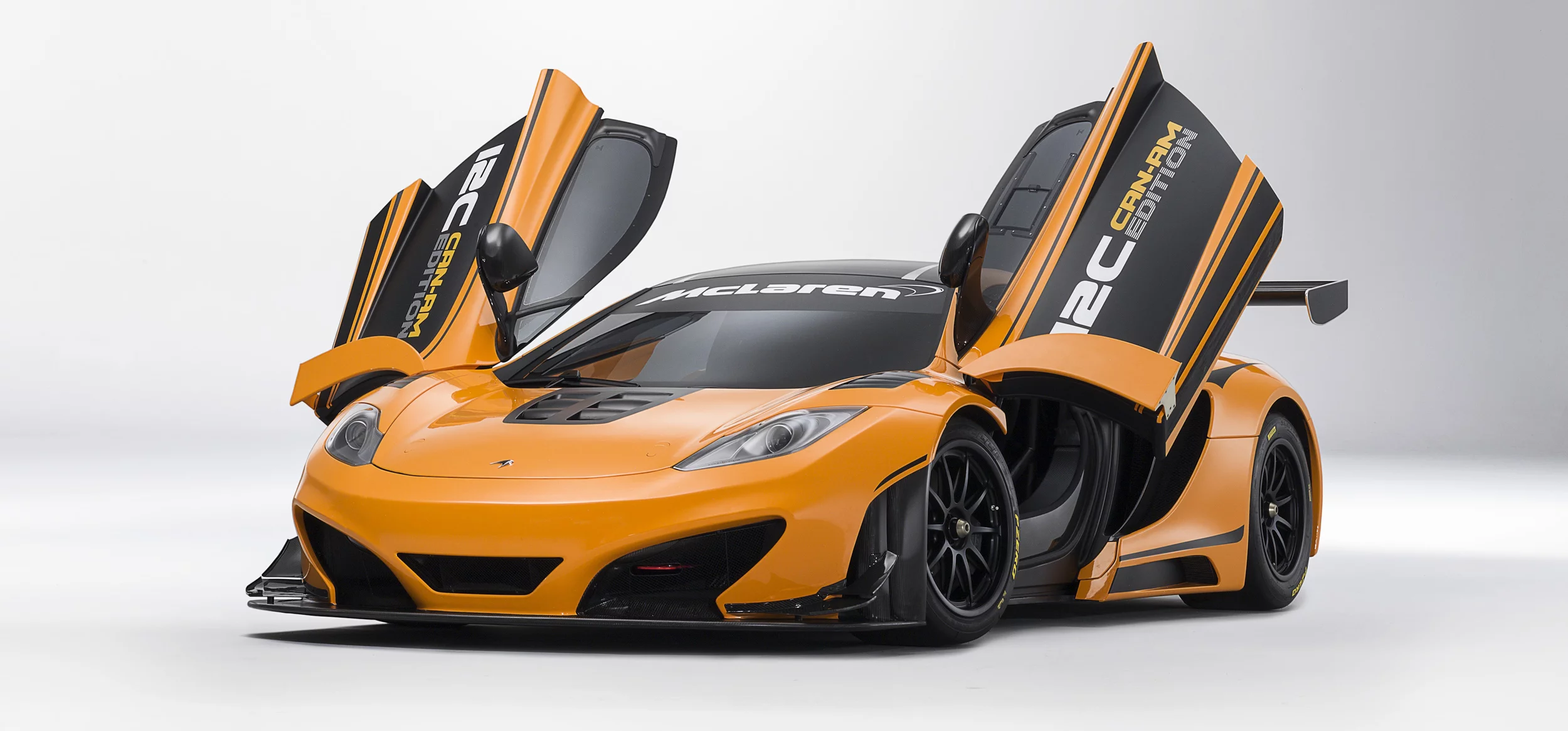McLaren 12C Can-Am Edition racing concept low front angle view door open