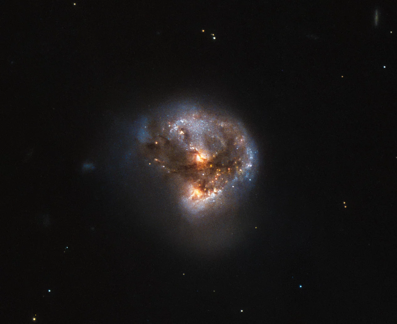 This galaxy is a megamaser. Megamasers are intensely bright, around 100 million times brighter than the masers found in galaxies like the Milky Way. The entire galaxy essentially acts as an astronomical laser that beams out microwave emission rather than visible light (hence the ‘m’ replacing the ‘l’). This megamaser is named IRAS 16399-0937, and is located over 370 million light-years from Earth