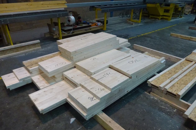 They're based on a prefabricated panel called ModCell that – put simply – comprises a timber frame with deep straw bale insulation packed inside and topped by a wood fiber breather board (Photo: ModCell)