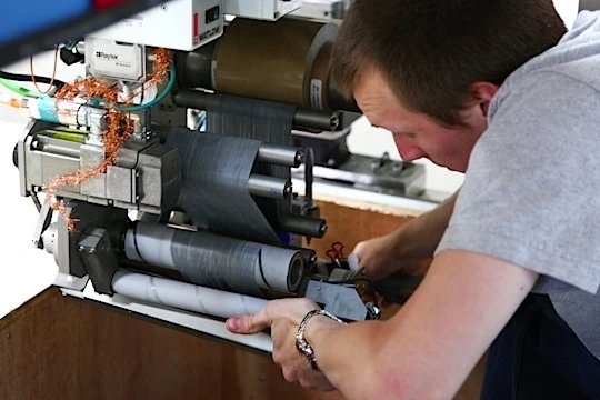 The computer-guided tape-laying head