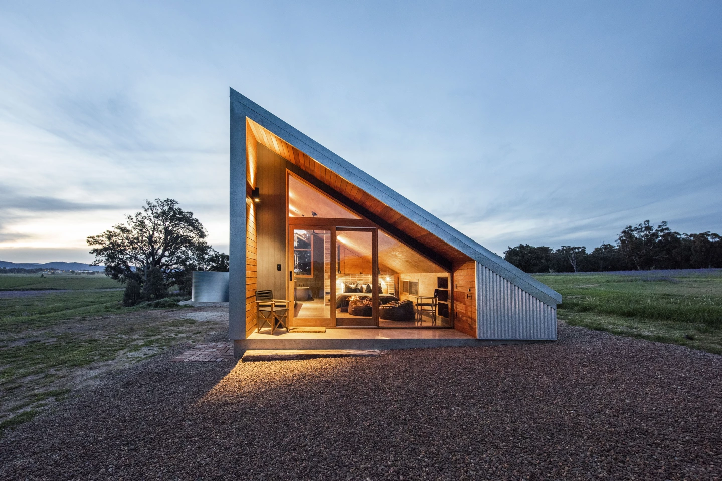 The utilitarian design of Gawthorne's Hut, by Cameron Anderson Architects, references a hay shed that was installed on the farm property, but was destroyed in a storm