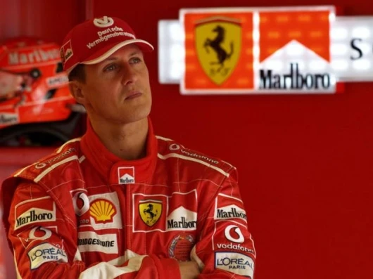 Schumacher watches the times in practice - had he not made a mistake in qualifying, he would have won the race, such was his speed once free of traffic