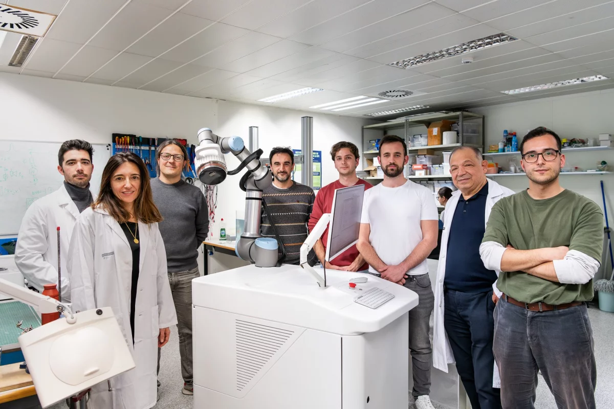 Members of the research team with the prototype Lithovortex machine