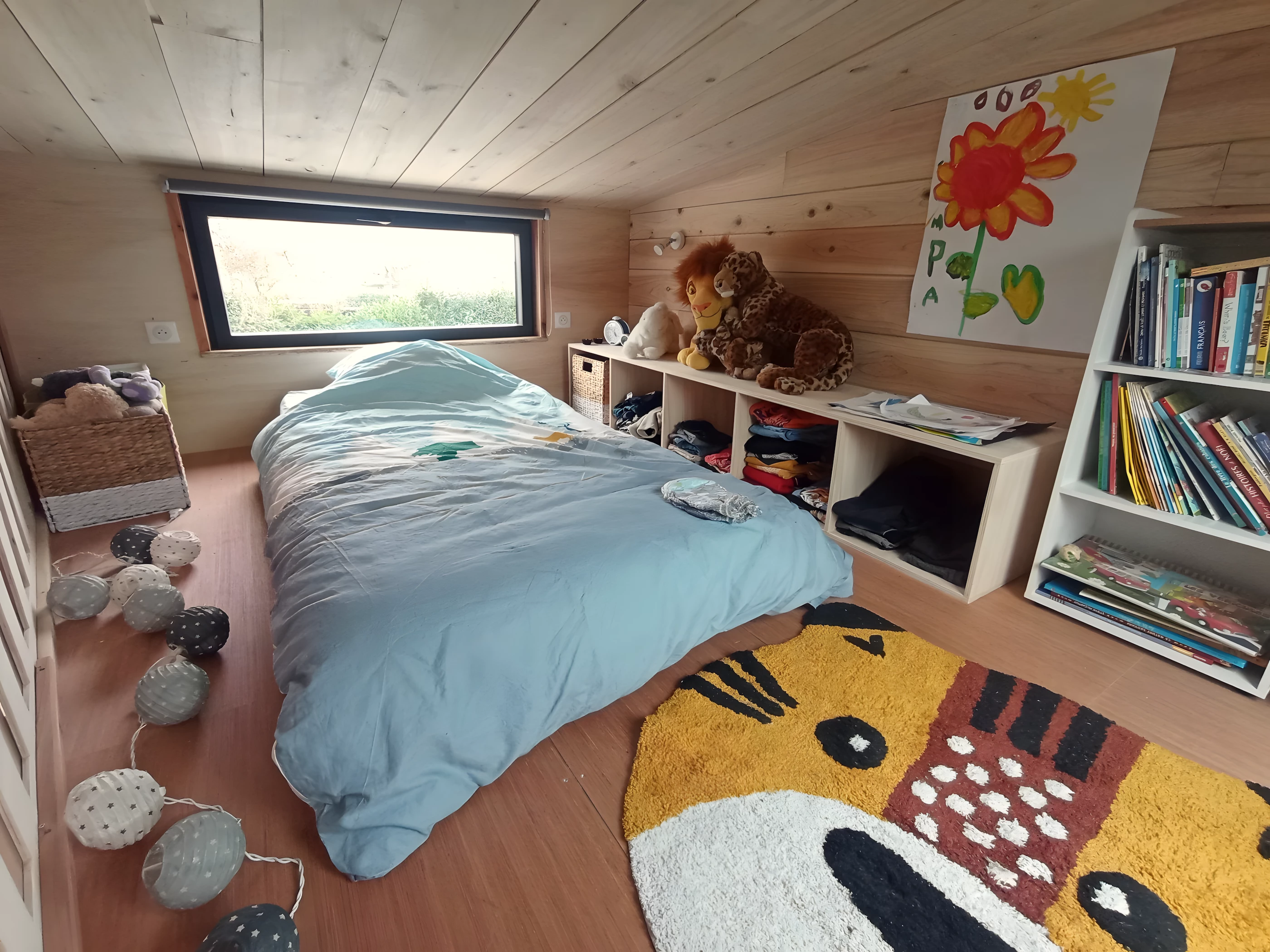 The Tiny XXL's bedrooms are typical loft rooms with low ceilings