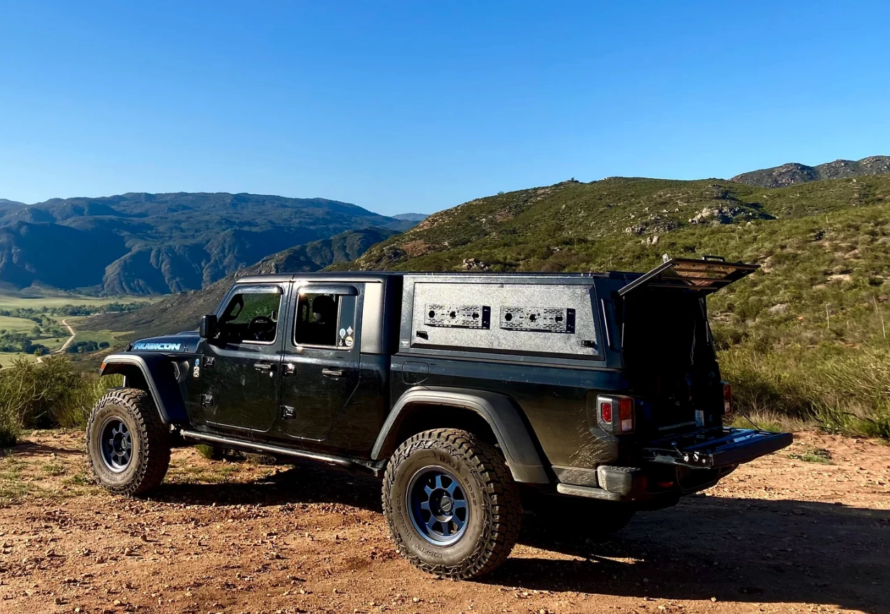 Gaia offers mounting pods for securing things like Rotopax canisters and shovels