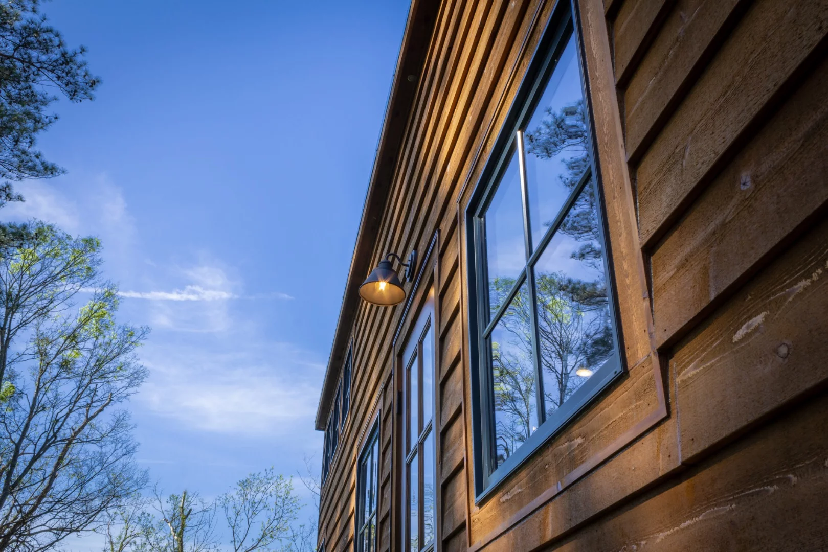 The Cedar House also sports blue accented windows