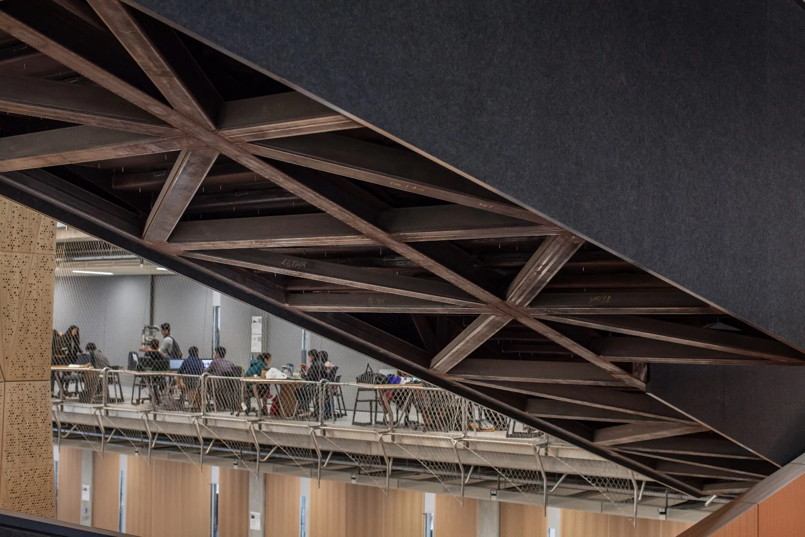 Many aspects of the building are left uncovered such as the mesh balustrades, bare concrete surfaces and exposed stairways