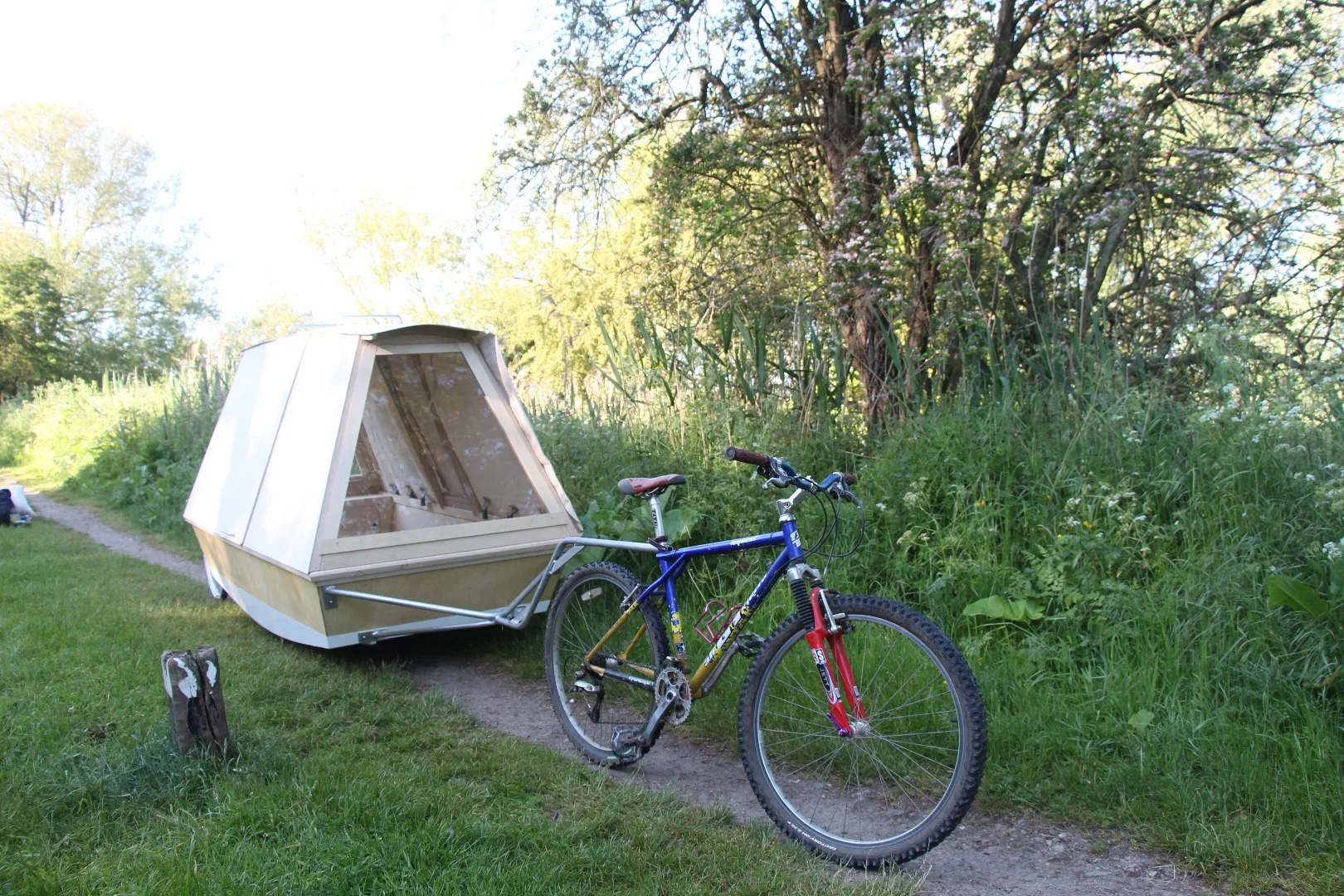 The floating shelter is relatively easy to tow on the back of a bicycle, with a simple clip on attachment and your off