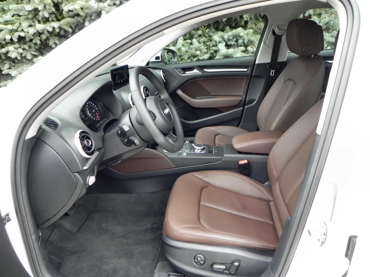 Turbine-resembling (and highly adjustable) air vents, well-trimmed leather, and quality materials adorn the cabin