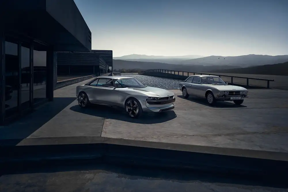 The e-Legend poses with the classic 504 Coupe that inspired it