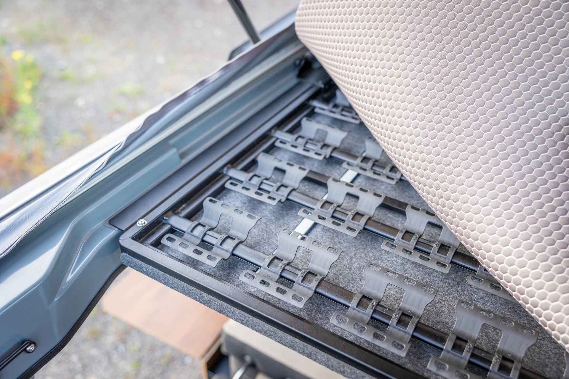The sleeper roof includes a suspension bed frame