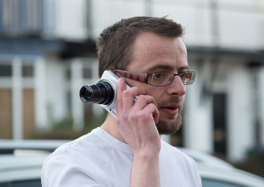You'd look stupid talking into the Samsung Galaxy Camera ... especially if a call came in while you were shooting