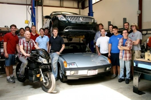 MIT's Electric Vehicle Team with their electric Porsche, electric motorbike and soon-to-be electric Ford