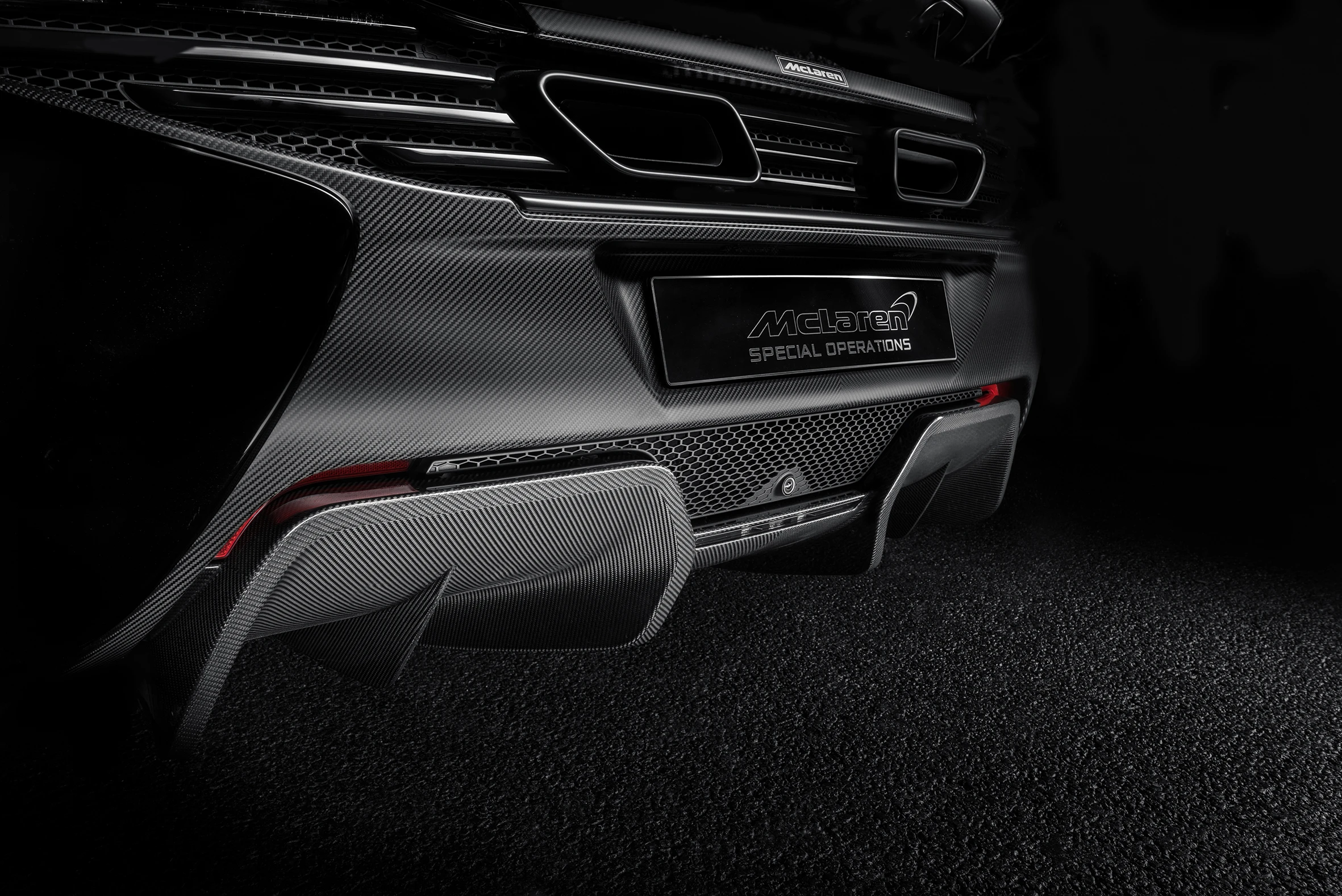 The GT3-inspired rear bumper on the MSO concept features a carbon fiber center section that carries through to the custom rear diffuser section.