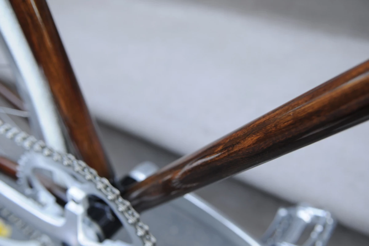 New Zealand's Rob Pollock hand-paints clients' bicycle frames with a faux woodgrain finish