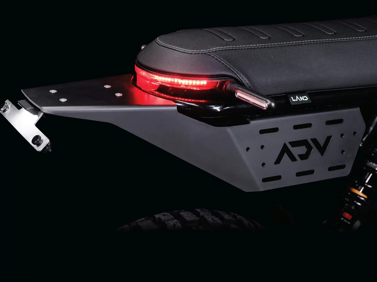 The District ADV comes with a full wrap aero aluminum fender that has multiple mounting slots for accessories and luggage