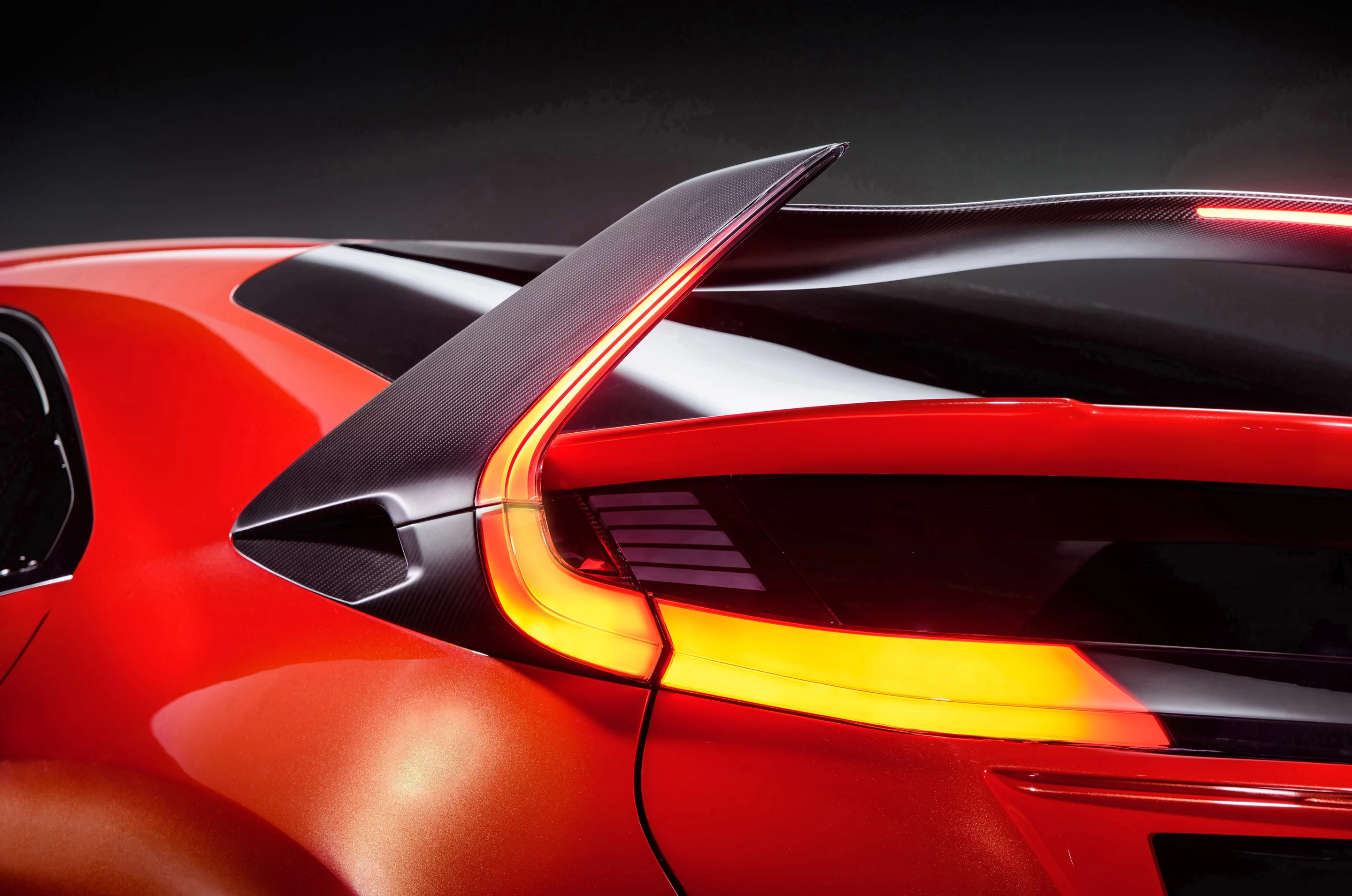 Track-inspired design features include a new shape and angle for the rear spoiler that provides additional downforce