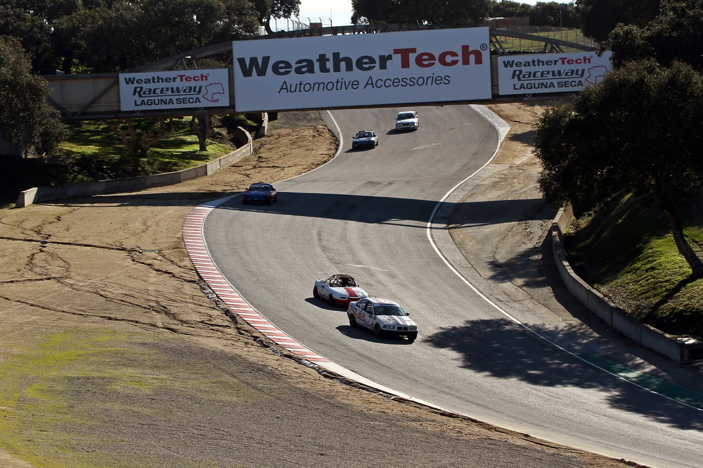 This is NOT the McMurtry Spéirling electric fan car ... this is just a photo I'd taken from the outside of turn 9, looking up at the Corkscrew, for a little perspective, even though the signage blocks the view of the top