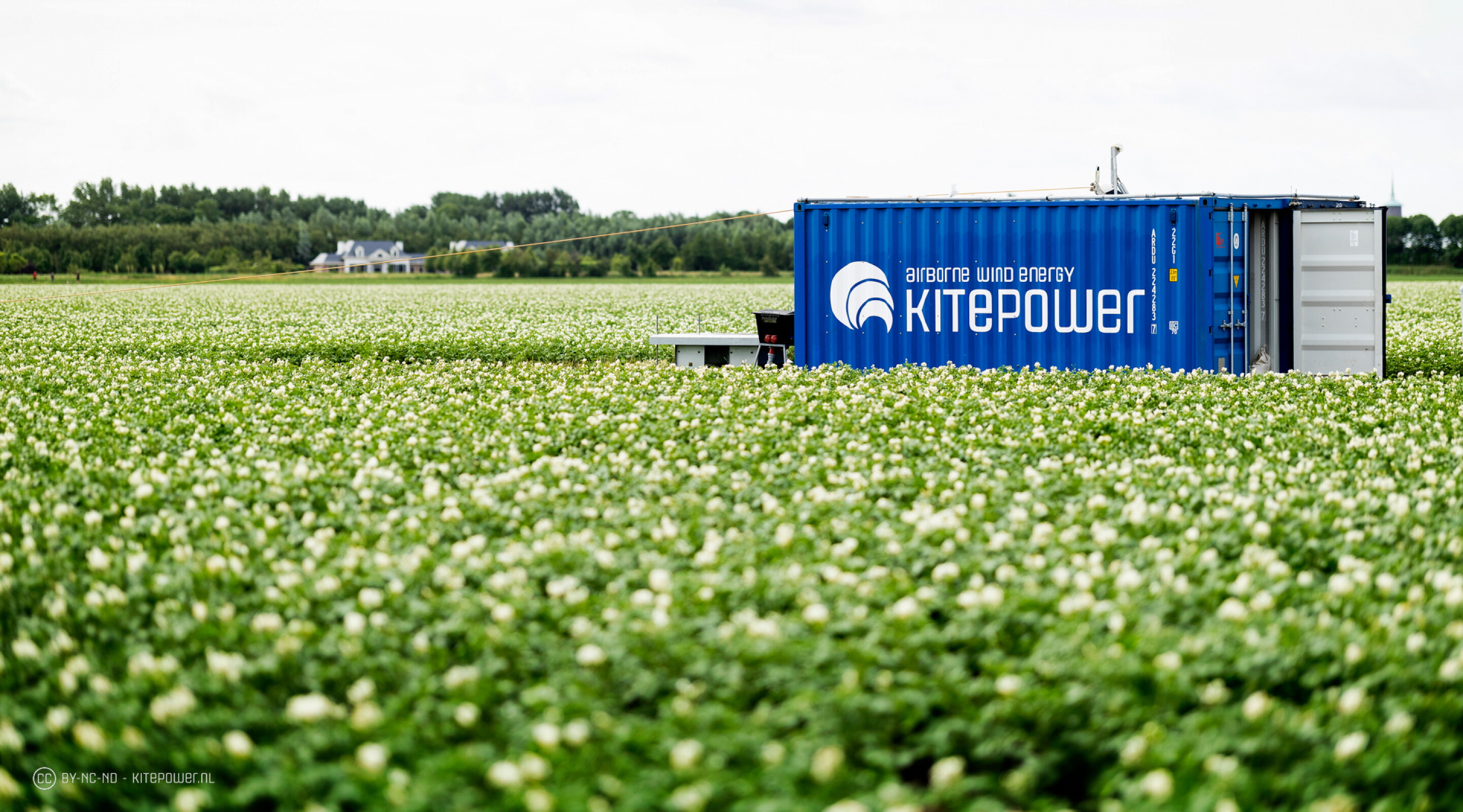 Container-based mobile battery hub recharged by kite power