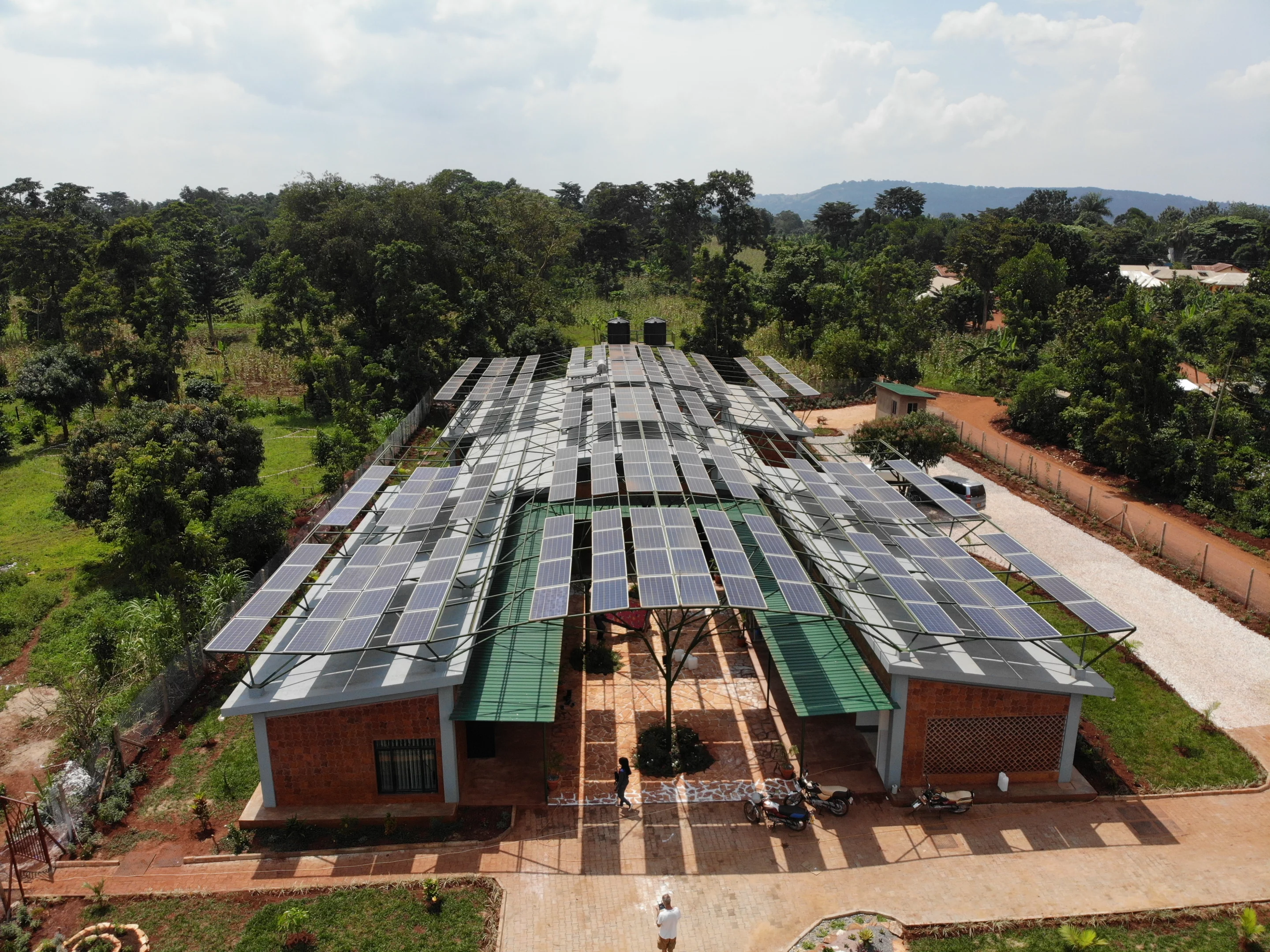 The Mount Sinai Kyabirwa Surgical Facility's solar panel array also shades the building and was inspired by the nearby banana plants