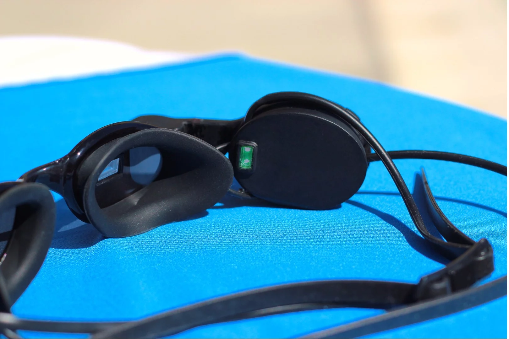 Zwim's display unit incorporates a six-axis accelerometer, along with an optical sensor (seen here) that measures the wearer's pulse via the skin on their temple