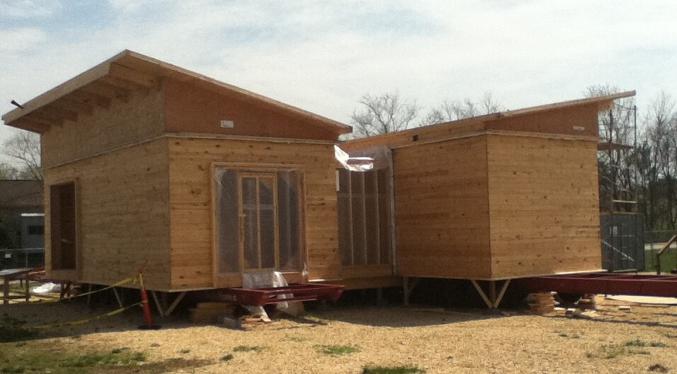 The WaterShed's butterfly roof collects sunlight and rainwater