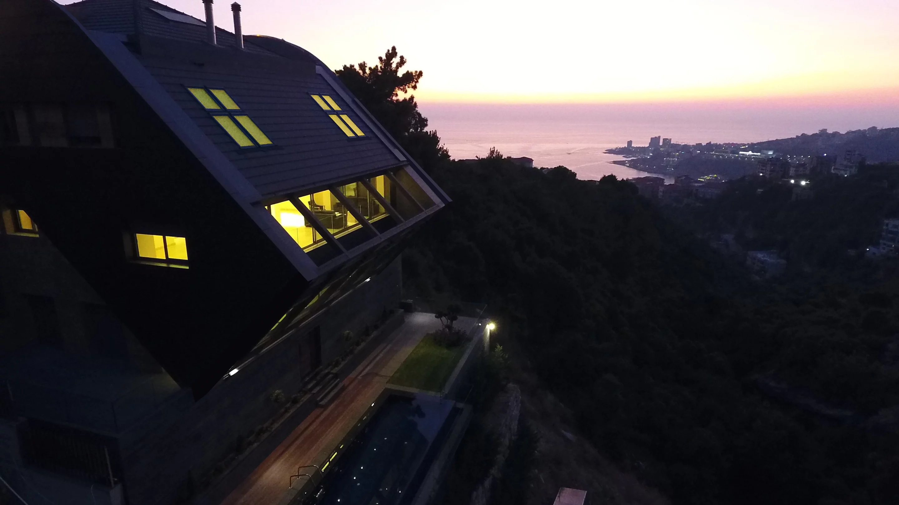 The CH730 Villa is situated on a 810 sq m (8,718 sq ft) plot on the edge of a cliff in Channiir, Mount Lebanon