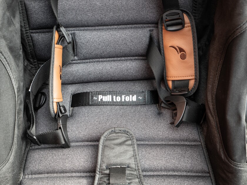 The pull to fold strap is the greatest strap in this world.
