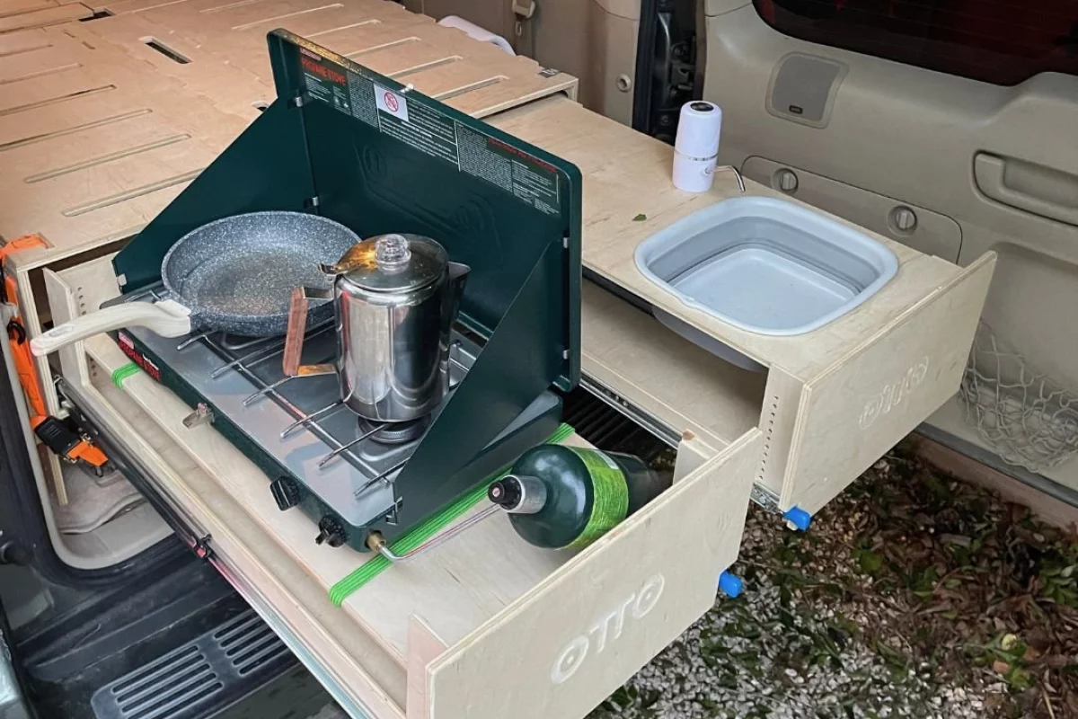 Removable lids on the Otto Nest's drawers allow them to serve as a pull-out kitchen