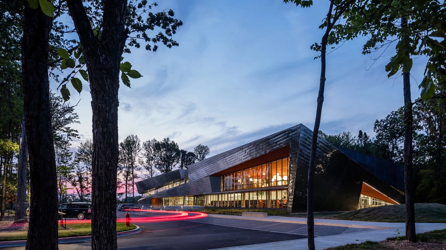 The Louisville Free Public Library South Central Regional Library is situated within a forest