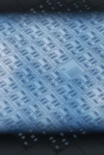 A wafer with a number of chips on it, each chip contains six tiny mass-spring systems and each system produces a different tone