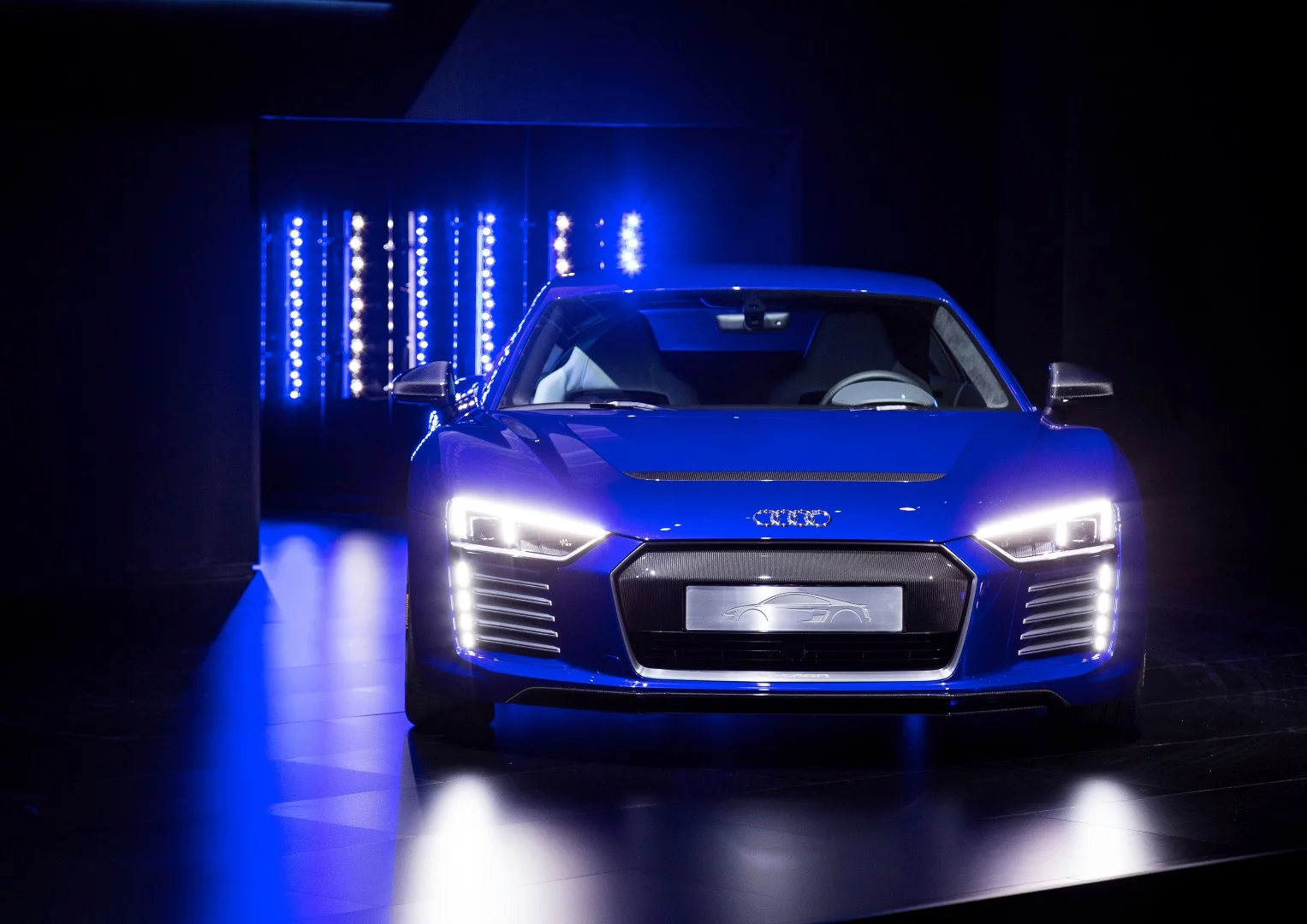 The R8 e-tron piloted driving concept makes a debut at the CES Asia show