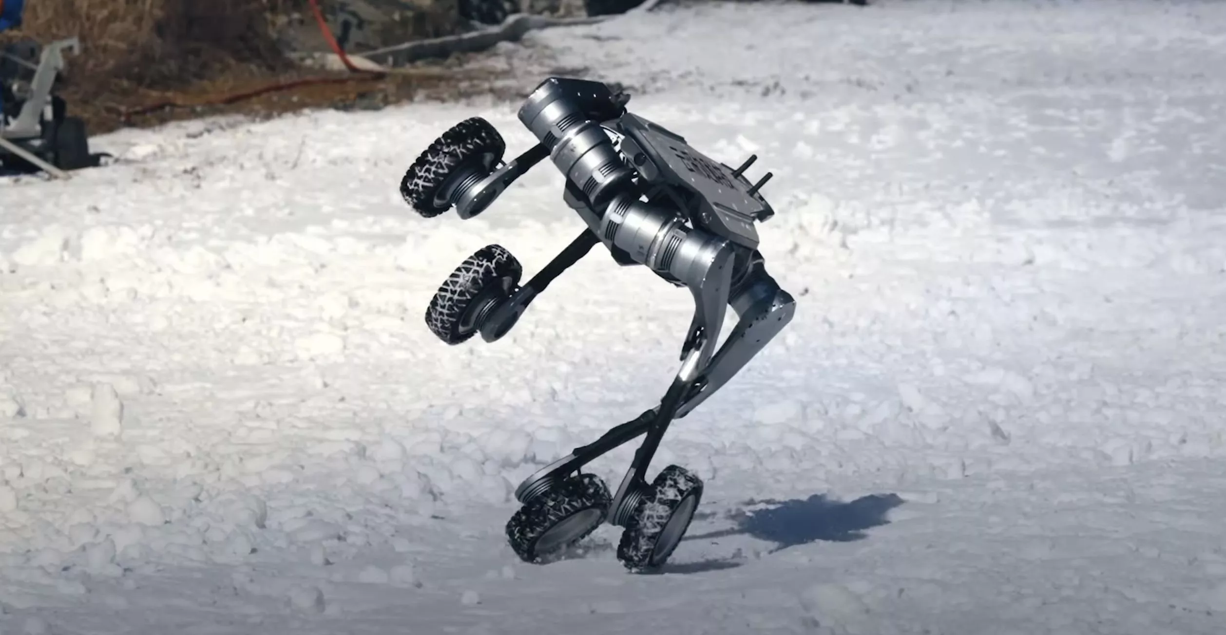 The Lynx wheeled quadruped from Deep Robotics demonstrates its impressive capabilities on snow, rocky terrain and through water