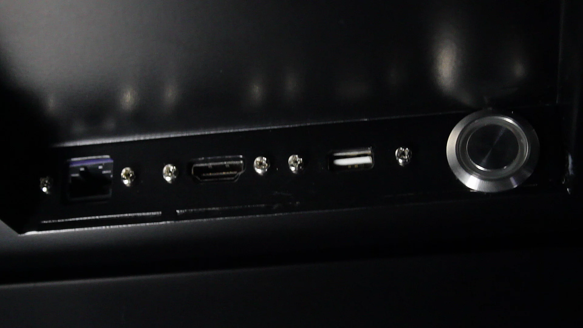 The connectivity ports are hidden from view and the unit's power switch can be locked away