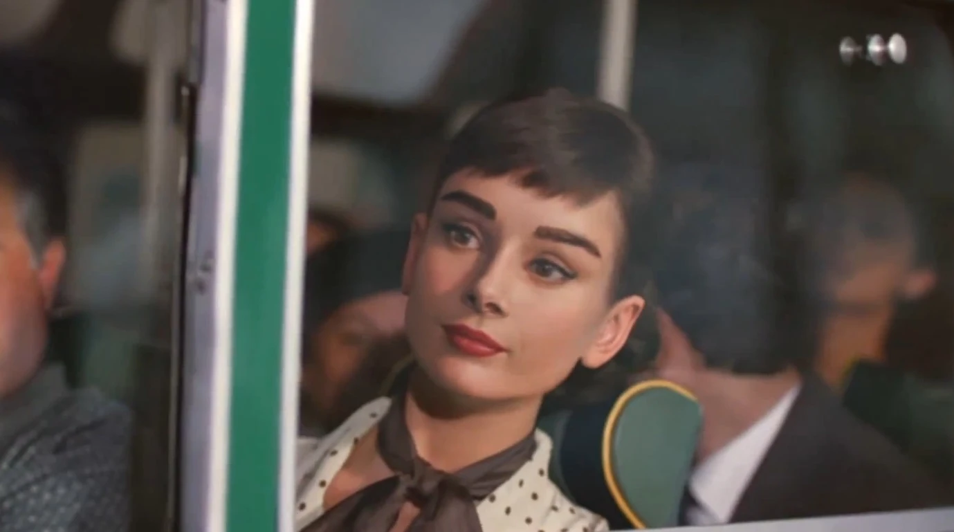 A computer generated Audrey Hepburn appearing in a Galaxy chocolate commercial