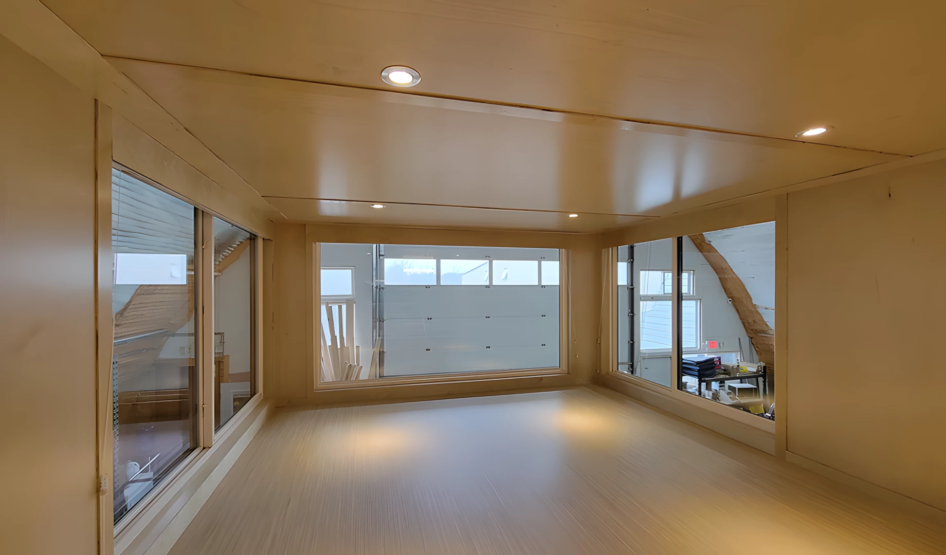 The Ultimate tiny house's upstairs level also includes a second smaller loft bedroom that's reached by gangway