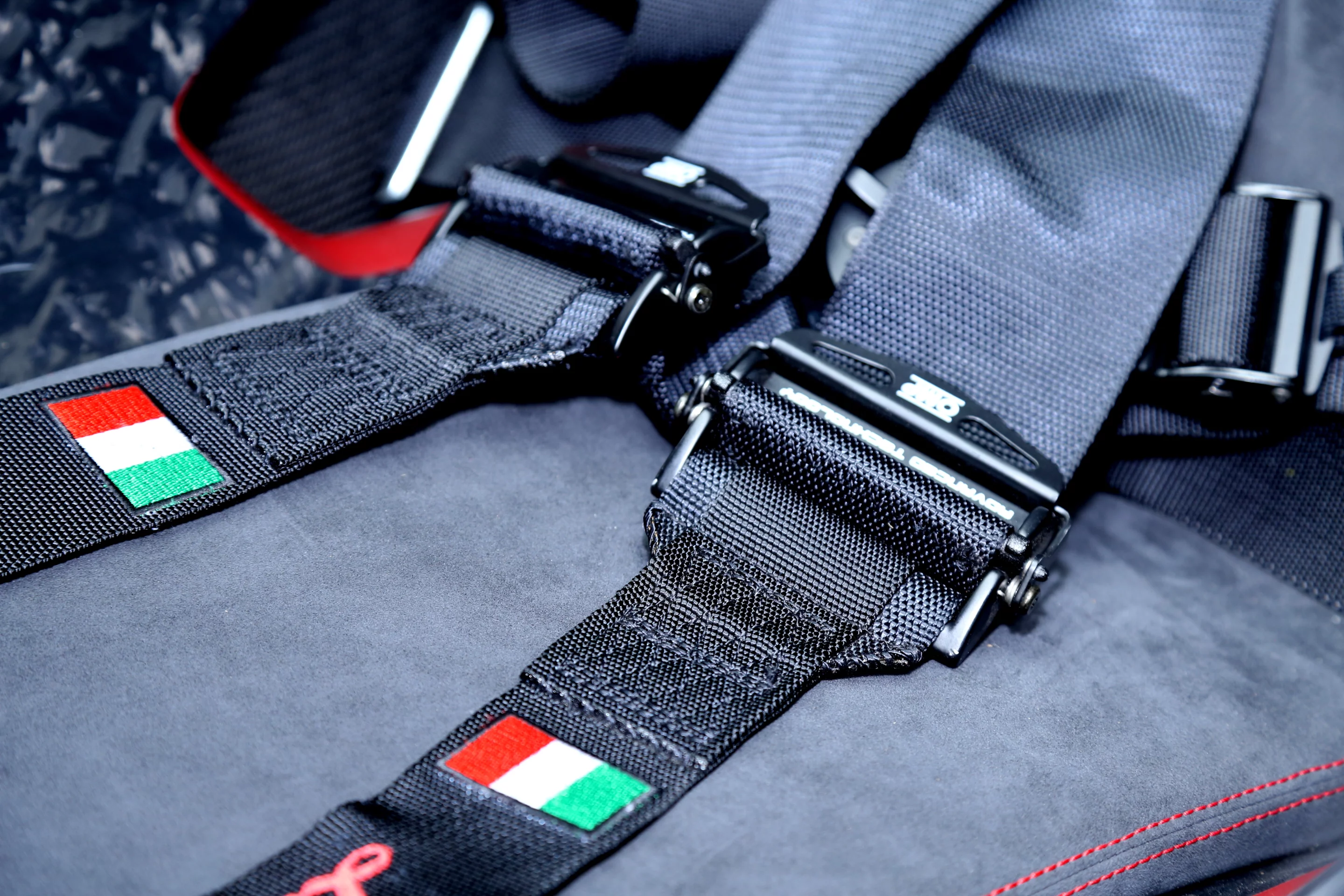 Italian themed racing seatbelts are standard with every Veneno purchase (Photo: Angus MacKenzie/Gizmag.com)