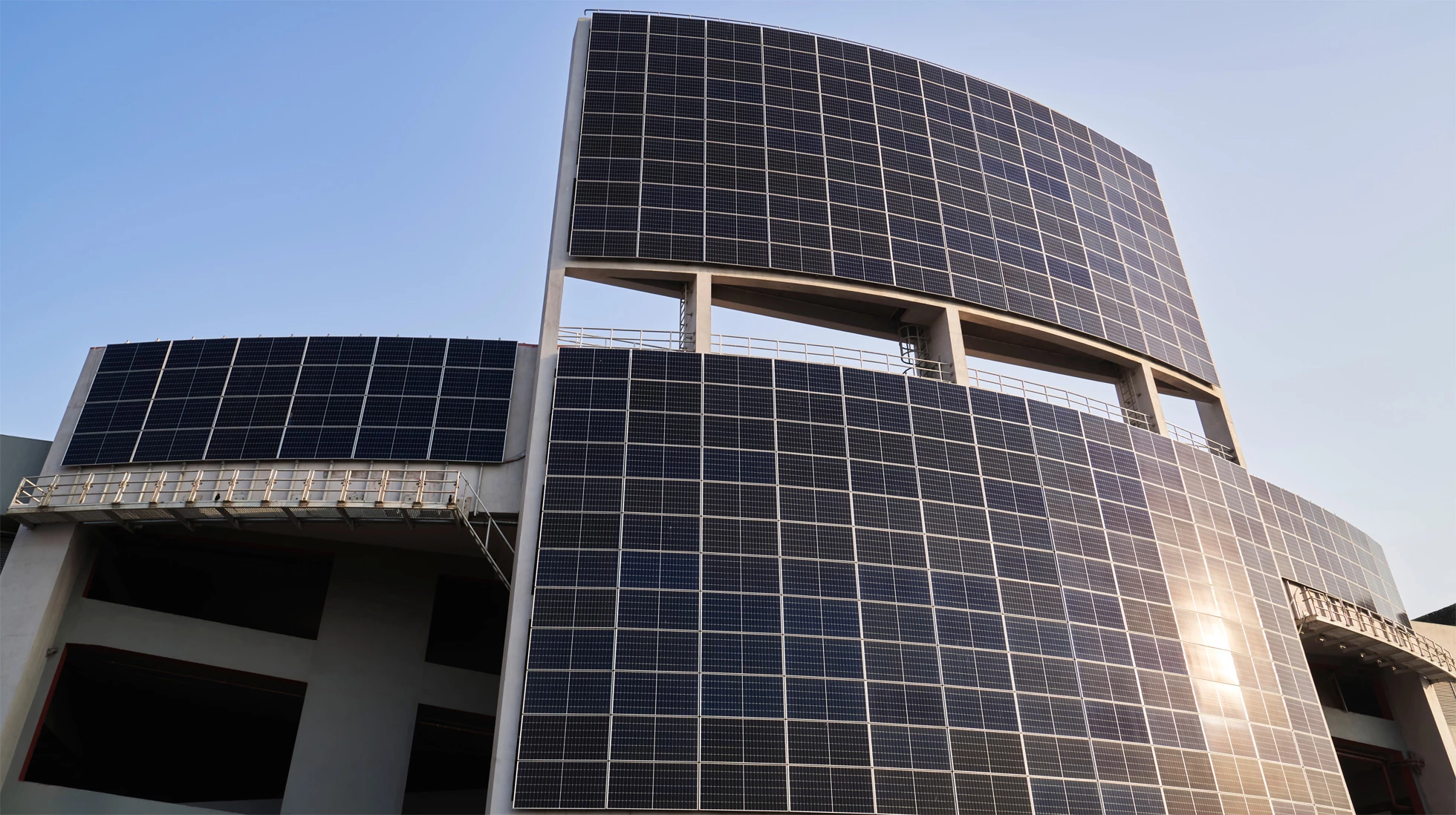 Apple BKC reduces its grid-based power needs with a solar panel array that's attached to the exterior of the building