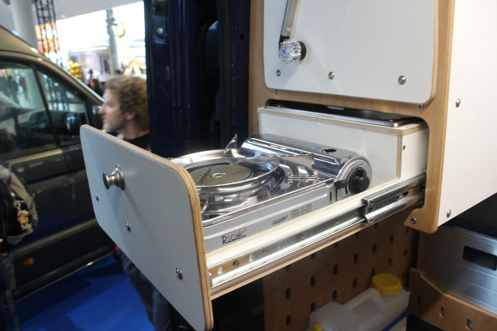 Slide-out stove on the Cargo Camper City Sprinter