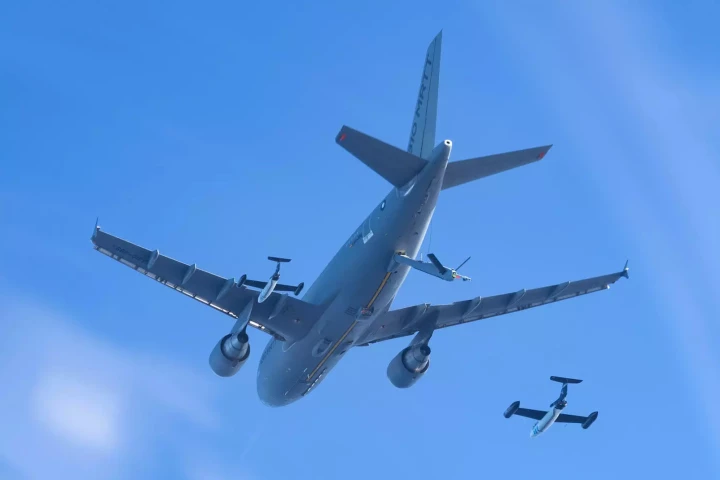 DT-25 drones fly in formation with an A310 Multi-Role Tanker Transport