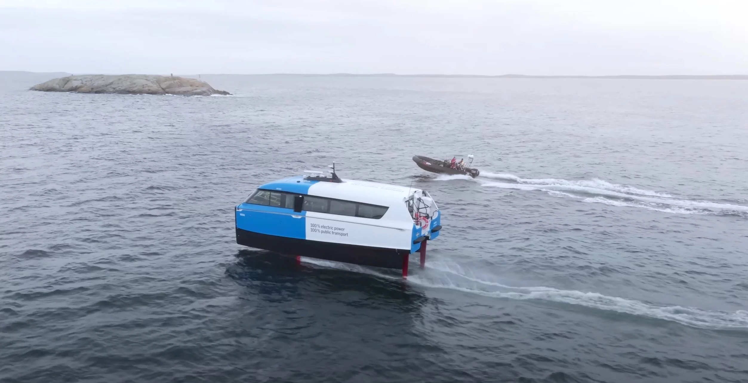 The Nova P-12 cuts through the water while the chasing RIB gets bounced around