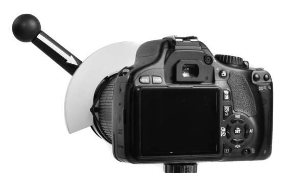 The Lens/Focus Shifter comes with a marker board which attaches to the lens with an elastic band