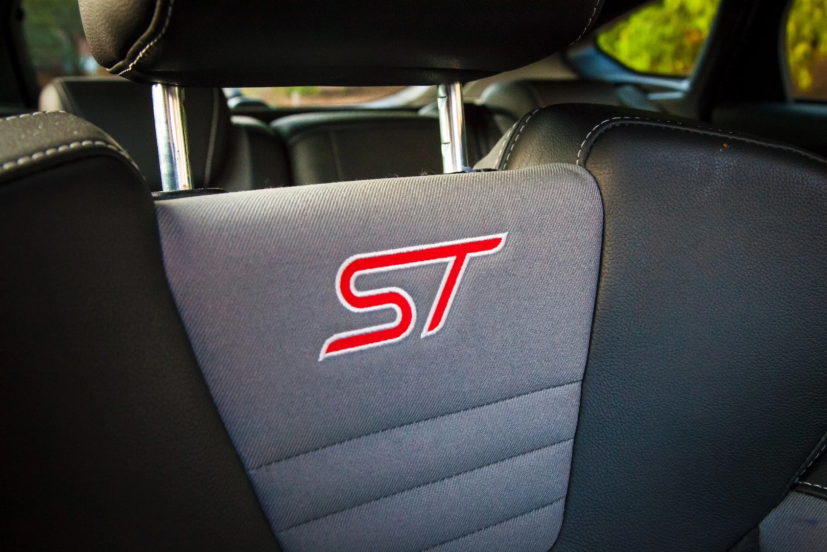 The interior is finished to a higher standard than the Renault Megane we drove last year, but there's still lots of racy touches around the cabin