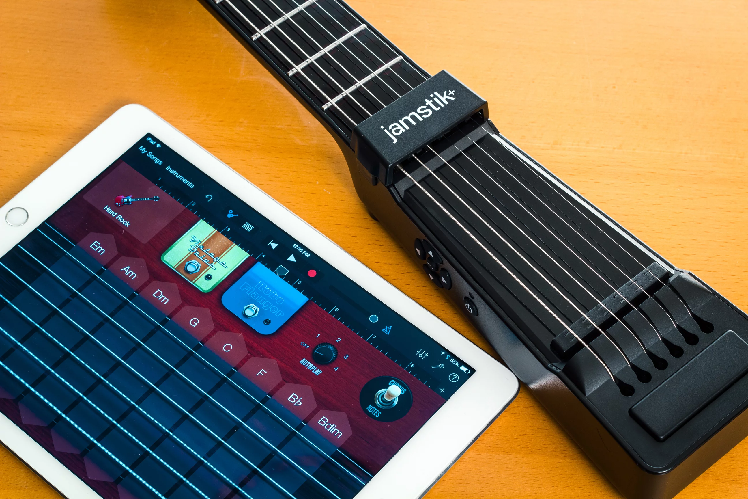 Finger positions on the short neck are tracked by infrared sensors and Zivix has partnered with Fishman to add a hexaphonic pickup "to offer a more natural playing experience"